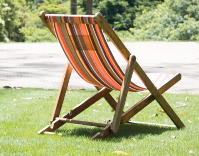 Deck chair on a summer lawn