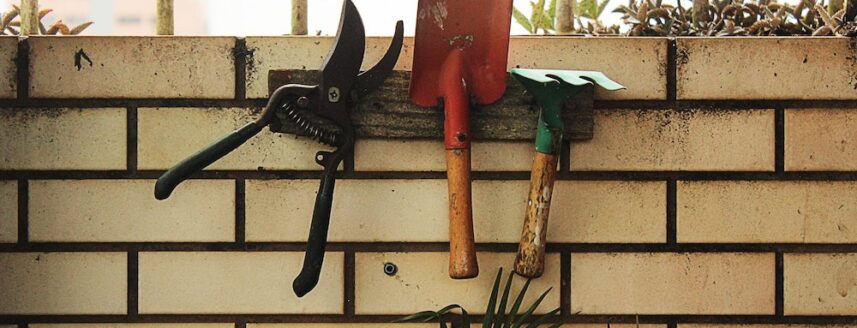 Garden tools hanging on the wall