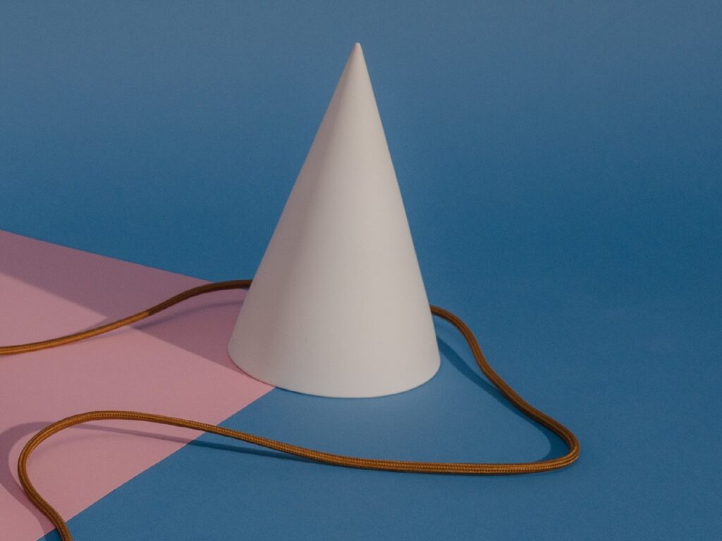 A paper cone fly trap
