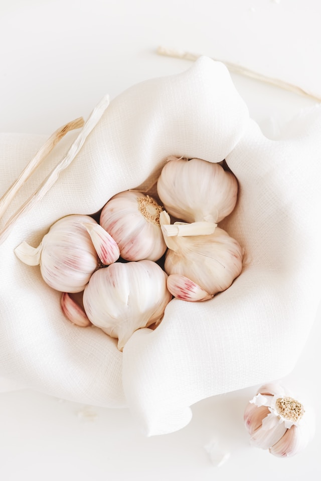 A basket full of garlic bulbs