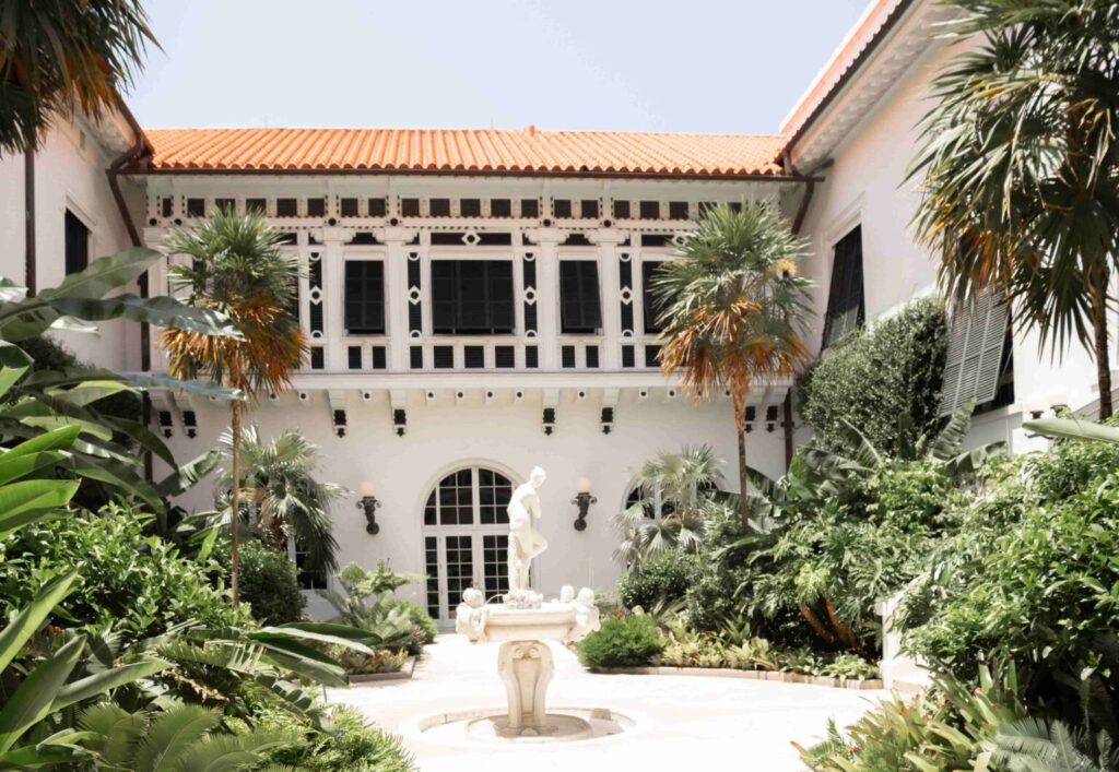 Mediterranean garden with statues and water feature