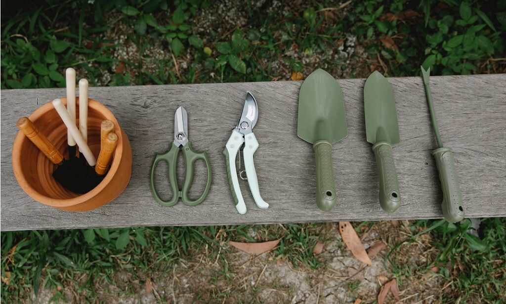 Gardening tools on a bench